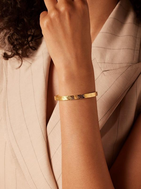 GUESS GUESS Armband in Gold 50% Rabatt mit kostenlosem Versand